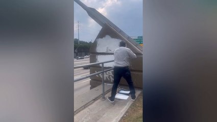 Ted Cruz paints over anti-Charlie Kirk graffiti on Texas freeway