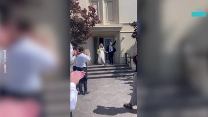 Bride Takes a Tumble in Wedding Exit