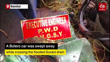 WATCH | Bolero Car Caught In Flooded Drain In Nainital; Two Rescued