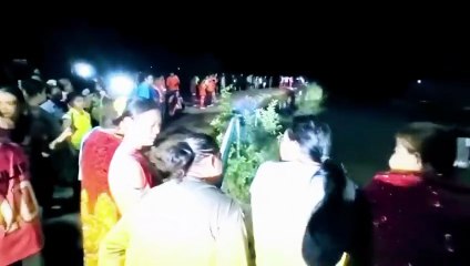Volunteer monitoring flood levels drowns after fall from bridge