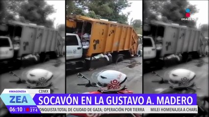Camión de basura se queda atrapado en socavón en Gustavo A. Madero