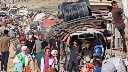 İsrail'in saldırılarından kaçan yüzlerce Filistinli aile zor şartlar altında kuzeyden güneye göç ediyor