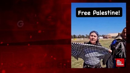 Gonca Cilasun uçaktan atladı Filistin kefiyesi açtı