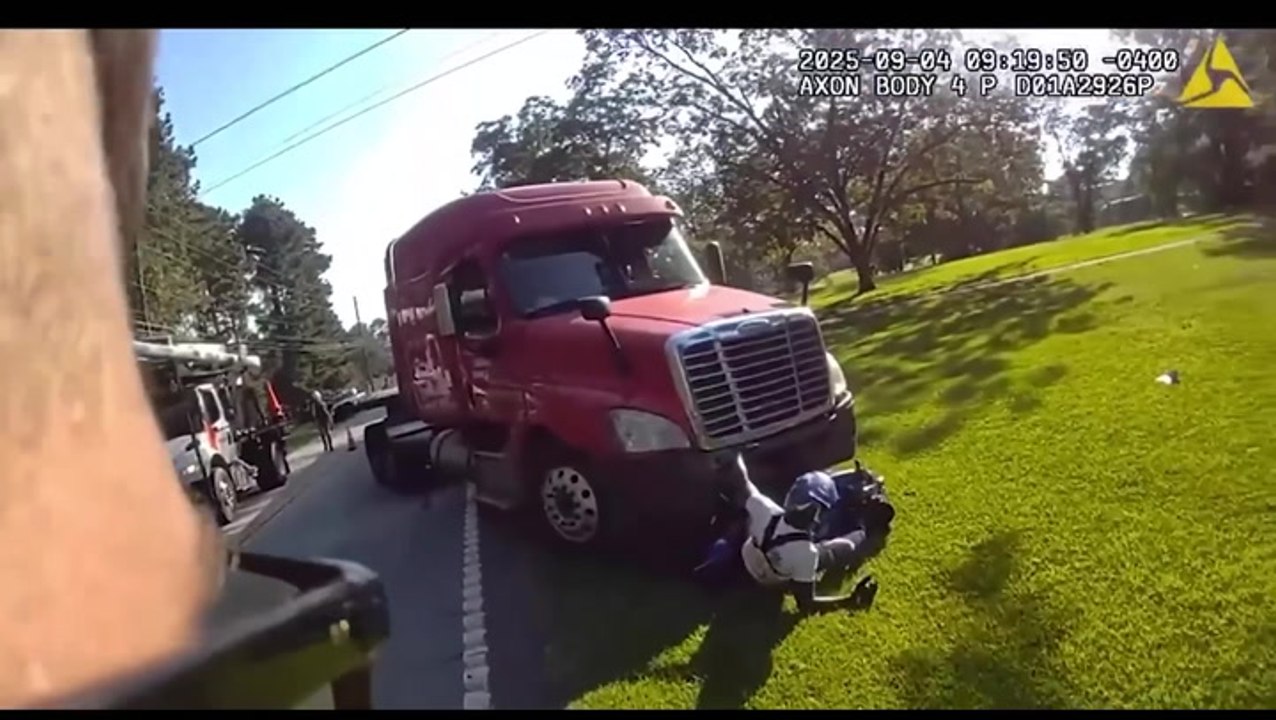 Fleeing suspect gets stuck under semi truck after speeding away from cops