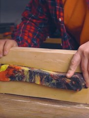 Watch how this crafter used recycled plastic lids to make an axe handle!