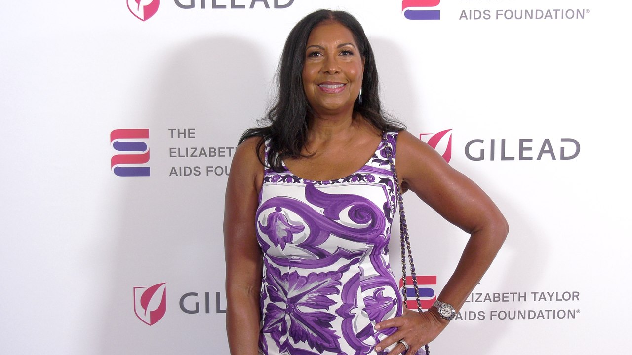 Cookie Johnson attends "The Elizabeth Taylor Night of Compassion" purple carpet