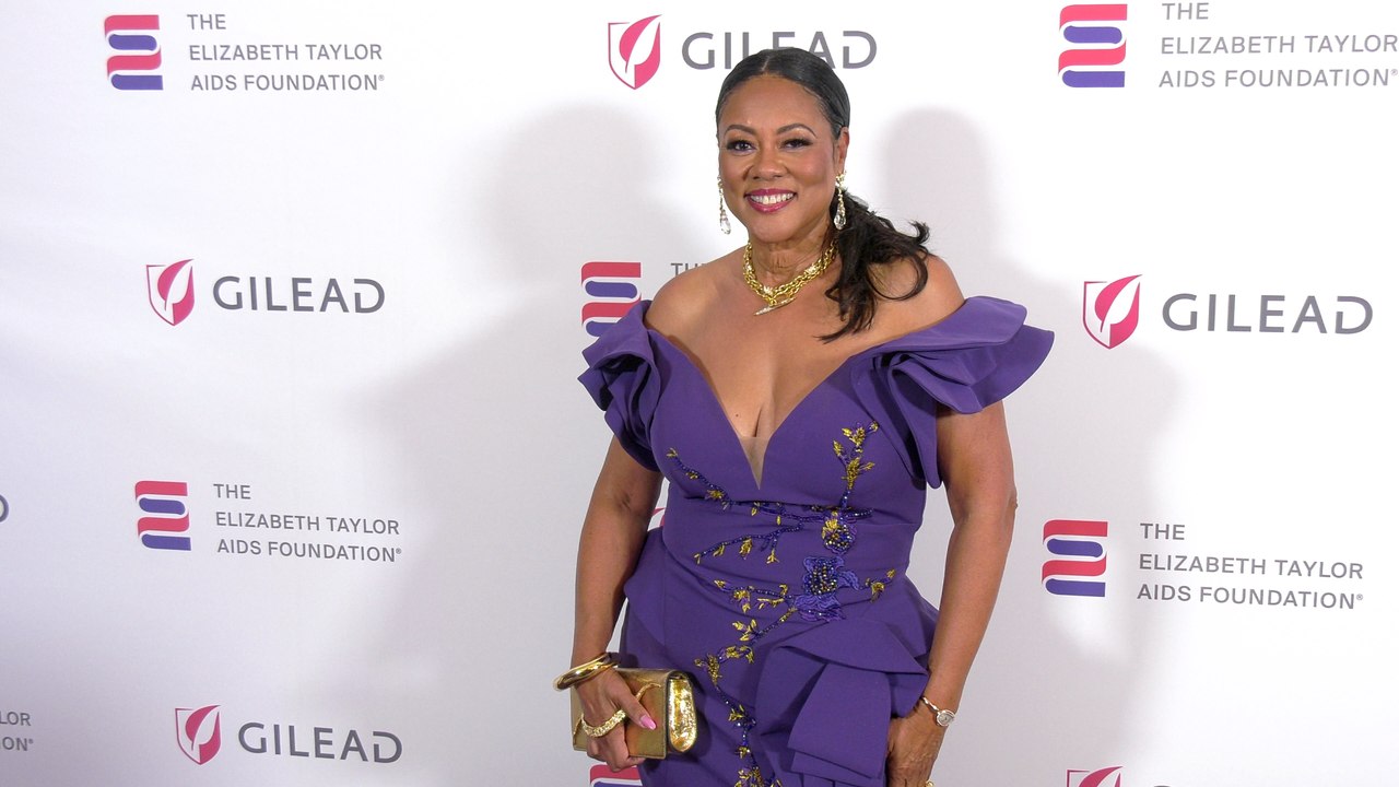 Lela Rochon attends "The Elizabeth Taylor Night of Compassion" purple carpet