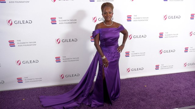 Vanessa Bell Calloway attends The Elizabeth Taylor Night of Compassion purple carpet