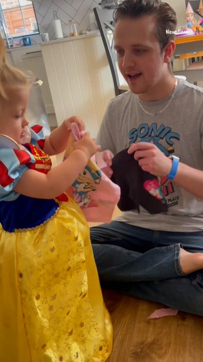 An Uncle and His Niece, Who Are Both Autistic, Share a Sweet Moment Opening Presents