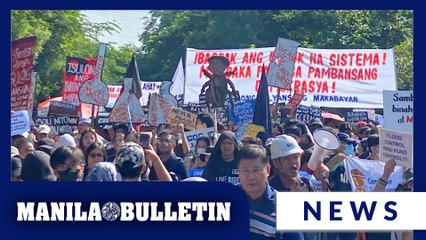 Protesters attend anti-corruption rally at Luneta Park in Manila