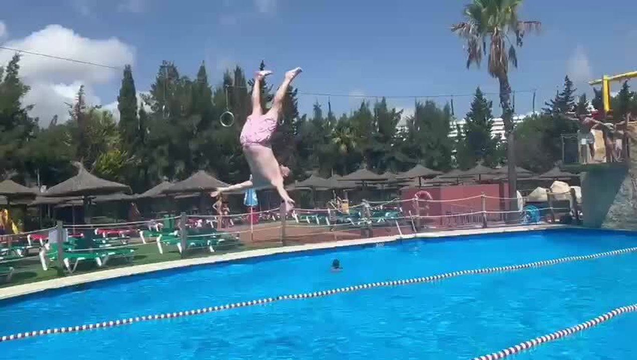 Ziplining Person Collides With Obstacle And Falls Into Pool
