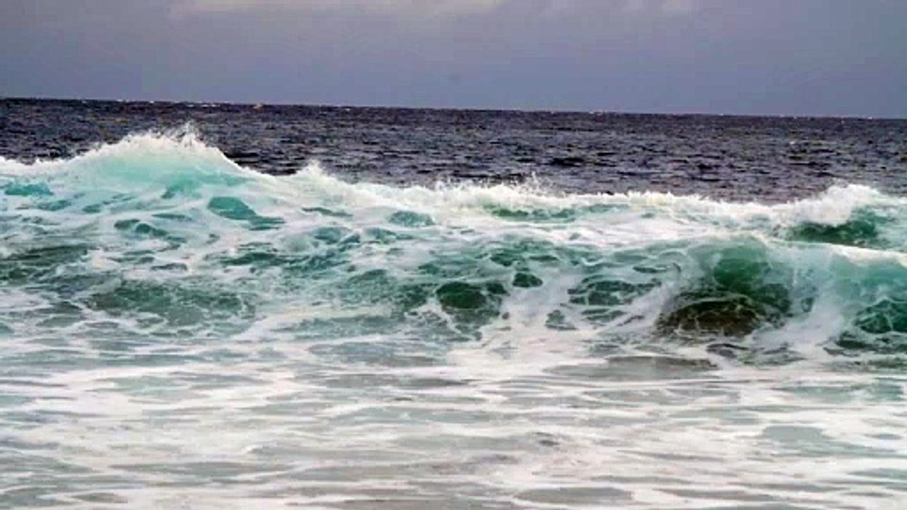 Waves Crashing in Rough Ocean