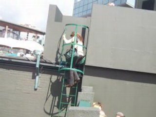 Annabel Croft  in Leather climbing to Commentary Box C2