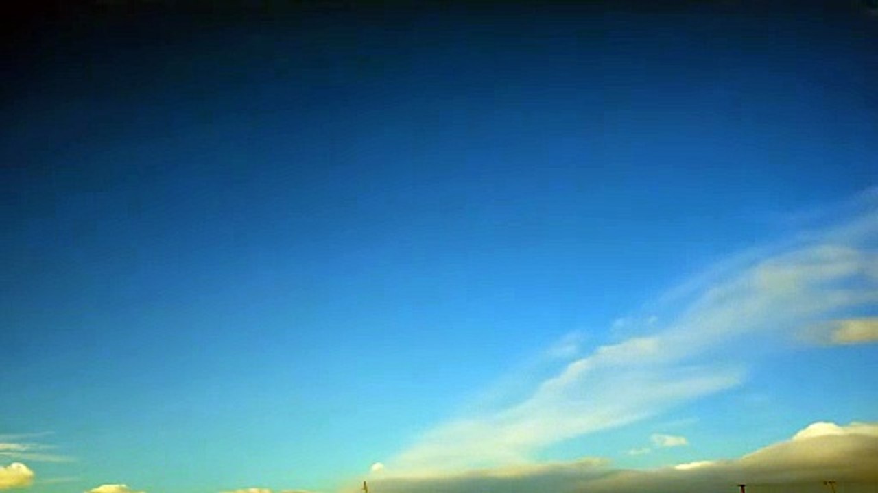Blue Sky with Fluffy White Clouds