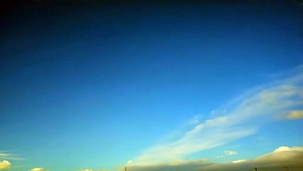 Blue Sky with Fluffy White Clouds