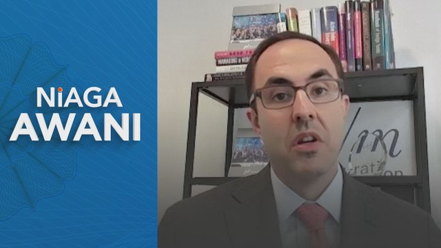 Wall Street slips as Fed signals rate cuts, investors eye inflation data