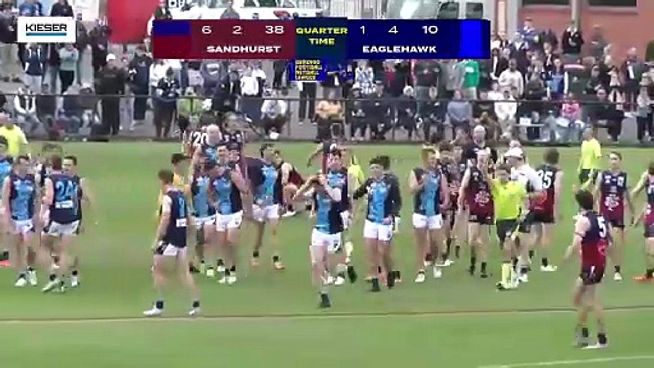 Clayton Holmes kicks Eaglehawk's first goal of grand final followed by yellow card.