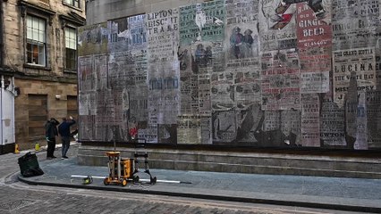 Vintage posters adorn Glasgow city centre lane as dressing for period drama gets underway