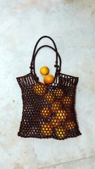 أزياء مصنوعة من أعشاب البحر .. انغماس لا مثيل له في أجواء الشاطئ الصيفية