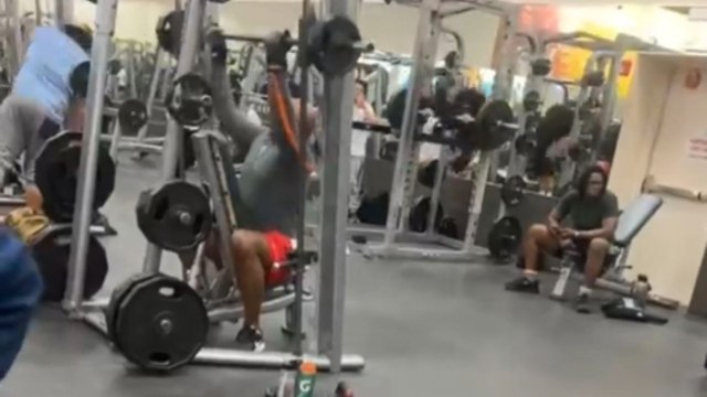 Fitness enthusiast performs odd and overly energetic moves during workout