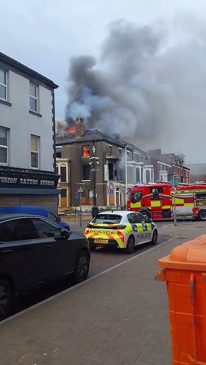 Fire fighters tackling large blaze in the centre of Blackpool with flames and smoke billowing from the roof