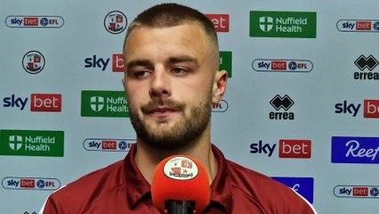 Crawley Town defender Charlie Barker reacts to Barrow defeat