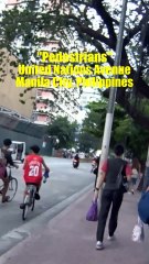 Pedestrians on United Nations Avenue in Manila City, Philippines