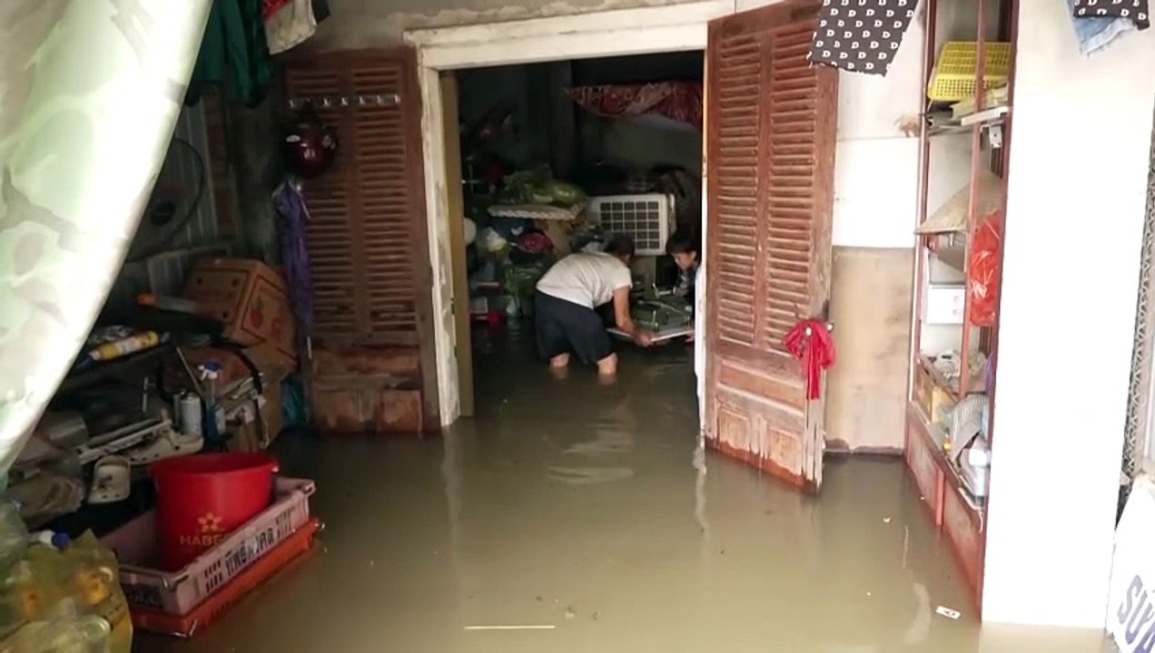 Vietnam residents face massive flood cleanup after Typhoon Bualoi