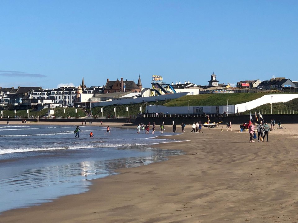 Sunny September day draws crowds to Portrush West Strand - video ...
