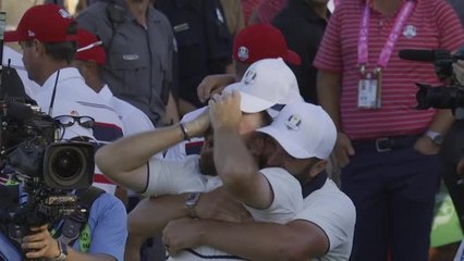 Shane Lowry sinks putt to retain Ryder Cup for Europe