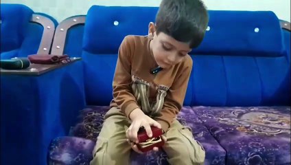 Affan Khan Chitrali Have a Small Size Holy Quran