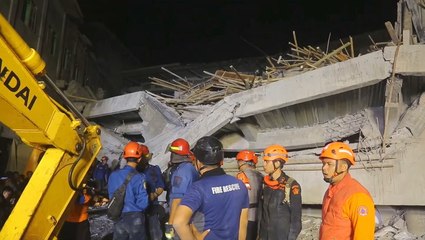Dozens trapped in deadly Indonesian school collapse as rescuers search for survivors