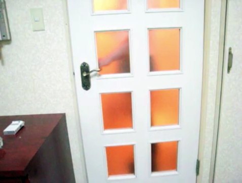 Unknown Japanese girl drinks coffee and then lifts her skirt up a bit