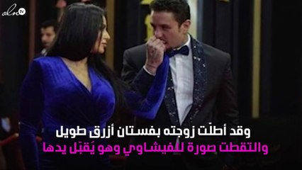 قُبلة جديدة من الفيشاوي لزوجته على "الريد كاربت"