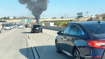 Fire engulfs truck loaded with Teslas on 5 Freeway in Sylmar & forces closure of southbound lanes