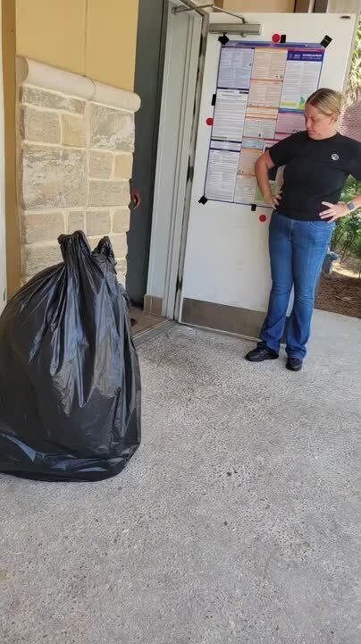 Coworker Jumps Out Of Bag And Scares Friend