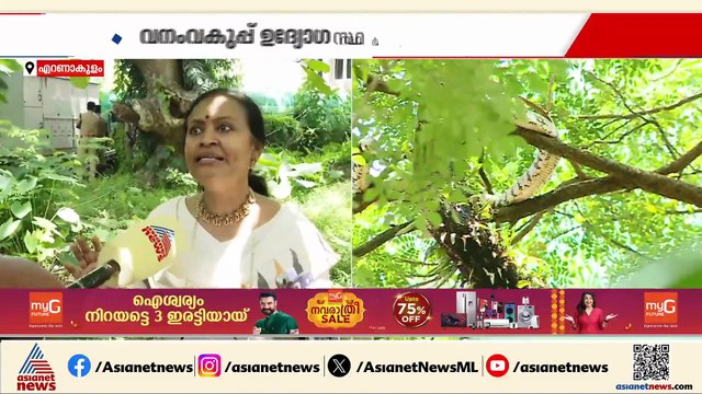 എങ്ങനെ താഴെയിറക്കും?... വെള്ളം ചീറ്റിച്ച് പാമ്പിനെ താഴെയിറക്കാൻ ശ്രമം, സ്ഥലത്ത് ജനക്കൂട്ടം