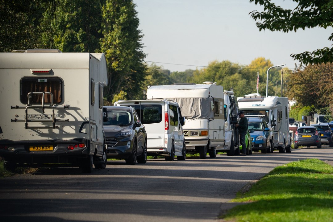 Fury as campervans and motorhomes invade idyllic riverside street - and it's legal