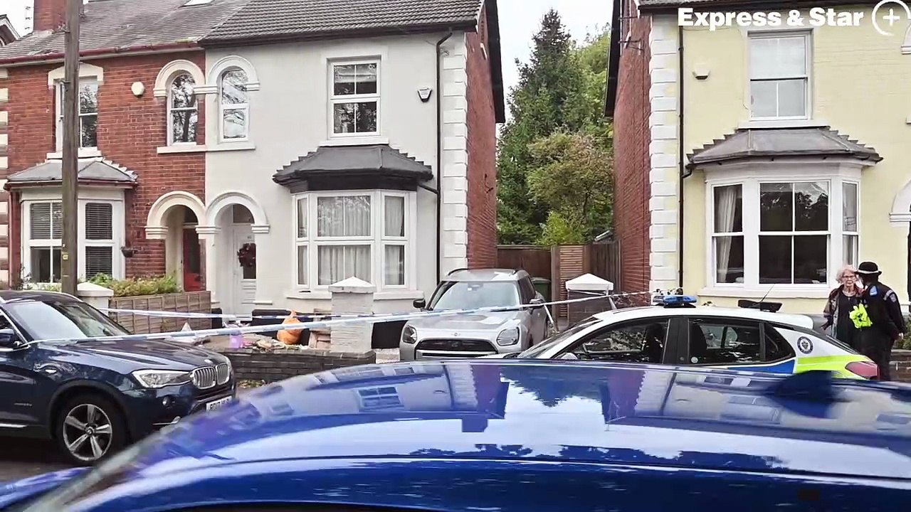 Floral Tributes at a house next to Bantock Park, Finchfield Roa, where a woman has been found dead and a man has been arrested.