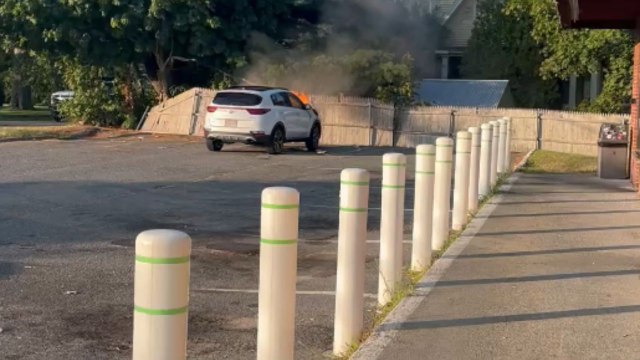 Police called to parking lot after car catches on fire outside pizza place