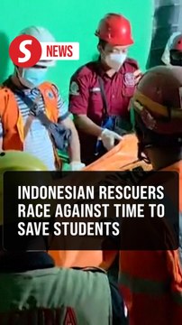 Rescuers recover survivors, dead following Indonesian school collapse