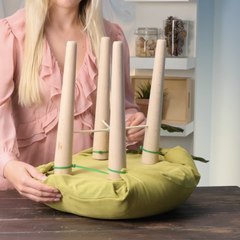 Le talent secret de cet oreiller ? Devenir la chaise la plus confortable