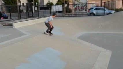 Girl skates at a skatepark and suddenly meets a fall