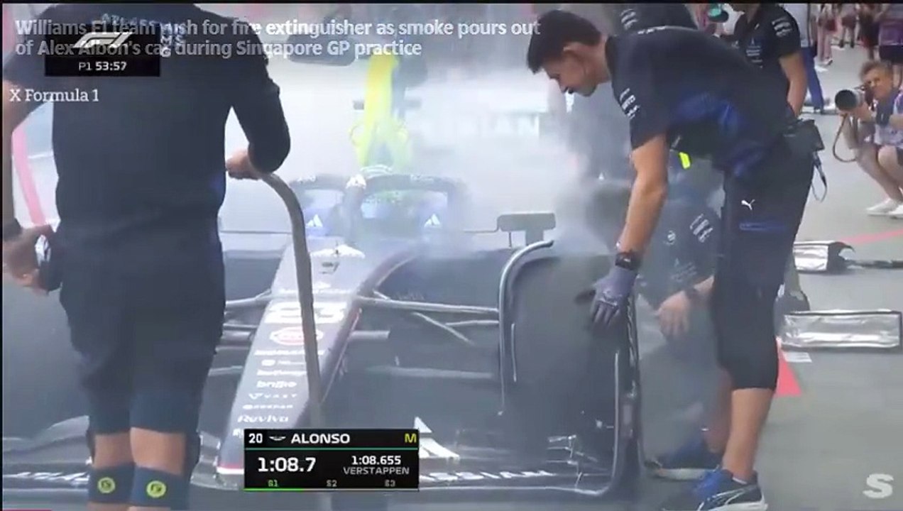 Williams F1 team rush for fire extinguisher as smoke pours out of Alex Albon’s car during Singapore GP practice