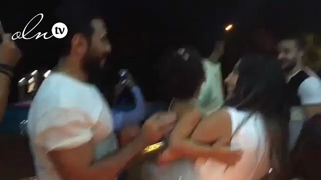 شاهدي.. بسمة بوسيل تخفي وجه طفلتها في عيد ميلاد تامر حسني