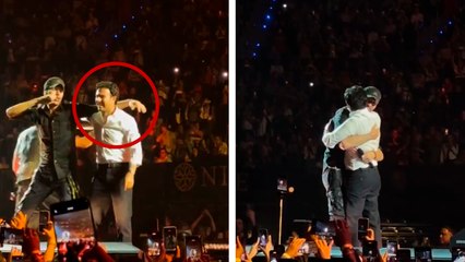 Checo Pérez aparece en el escenario junto a Enrique Iglesias