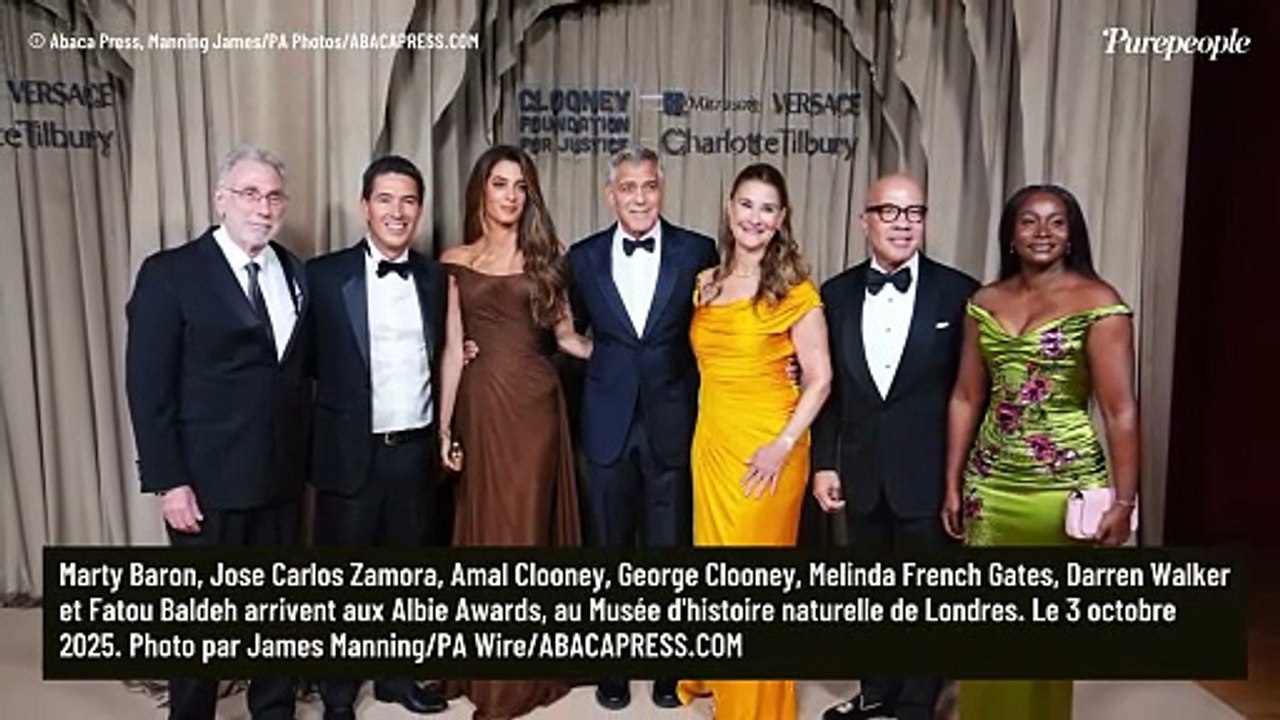 Amal Clooney somptueuse dans une magnifique robe drapée au bras de Georges Clooney à Londres