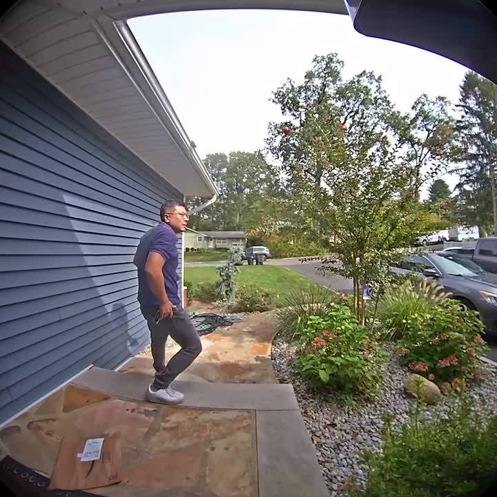 Delivery Person Accidentally Tosses Parcel Onto Roof Instead of Door