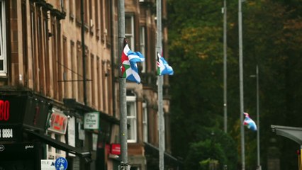 Glasgow- 'combined' Scottish-Palestinian flags have appeared on lampposts on the city's Victoria Road on the Southside.
