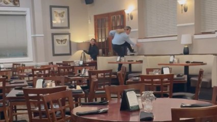 Parkour goes wrong: Manager collides with wall after table tilt